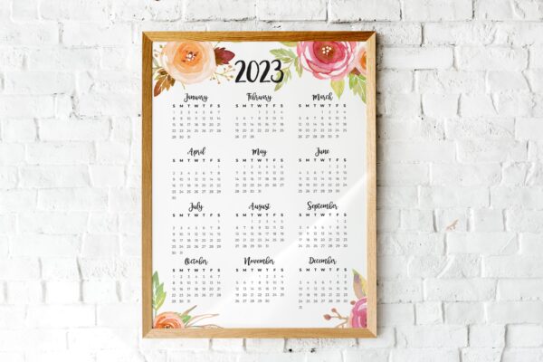 2023 Printable Calendar At a glance with watercolor rose graphics.